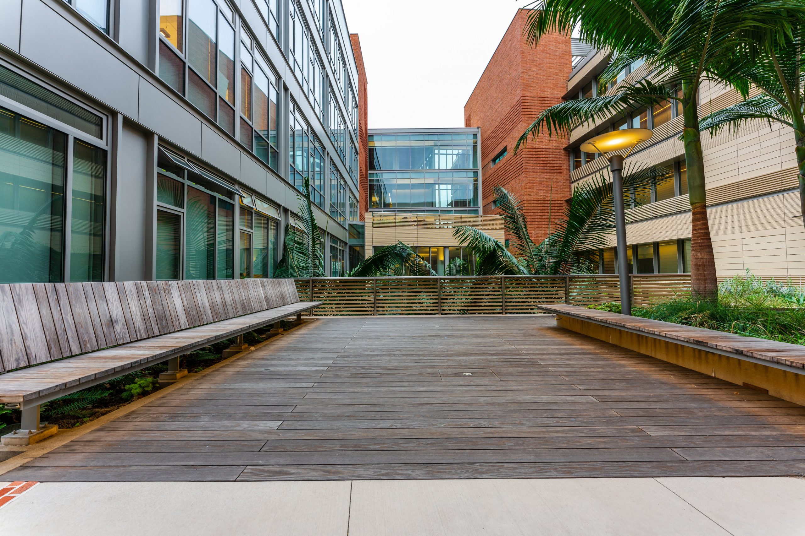 Side view of the UCLA Computer Sciences Department building in Los Angeles, California featuring Kebony Modified Wood Clear Decking used in the deck area outside the building