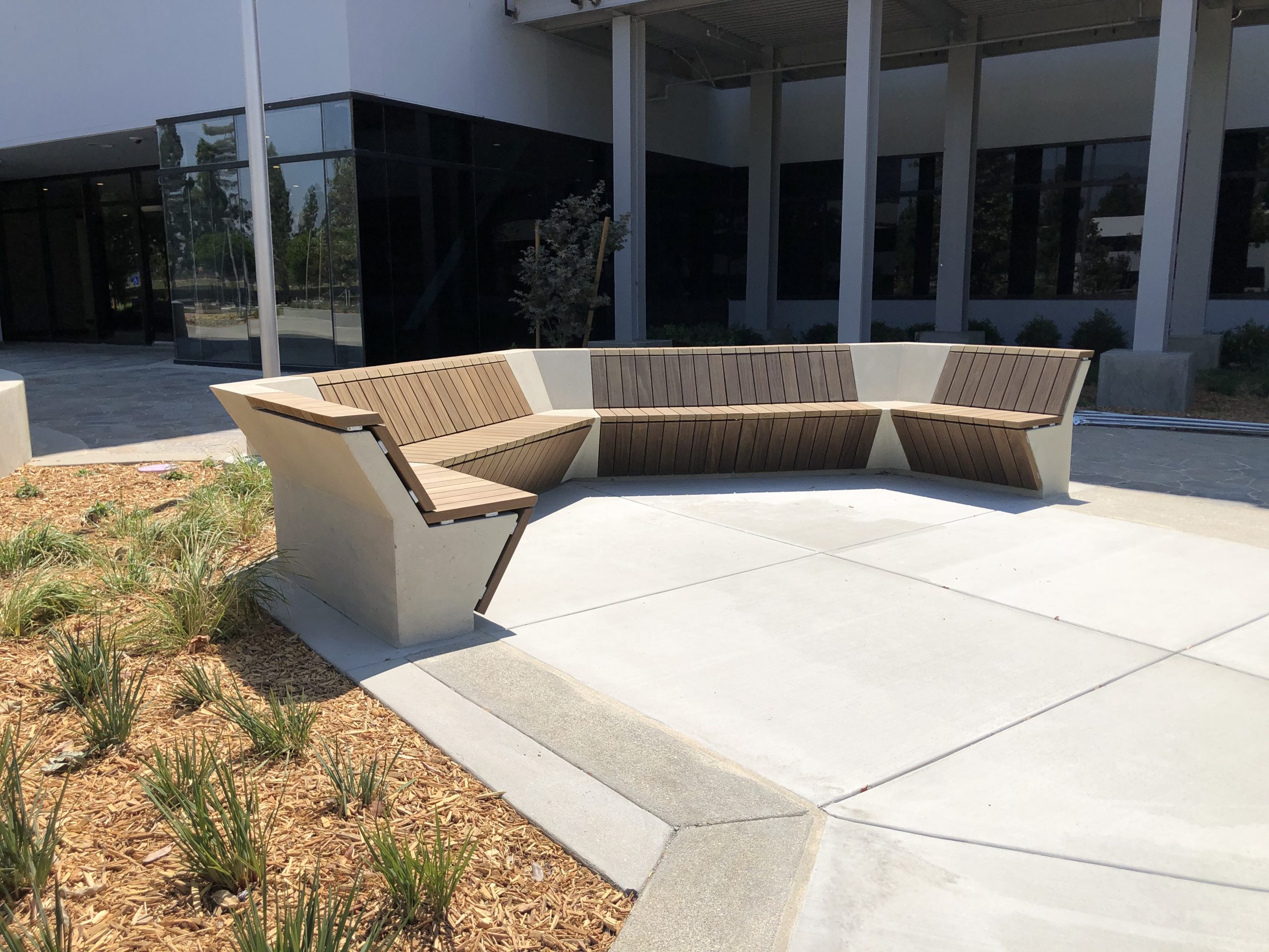 This project is the inaugural installation of the North Cape line, featuring table tops, bench tops, and litter receptacles composed of Kebony modified wood Clear and DM Braun manufactured heavy-duty steel framing located at the Inland Empire Health Plan