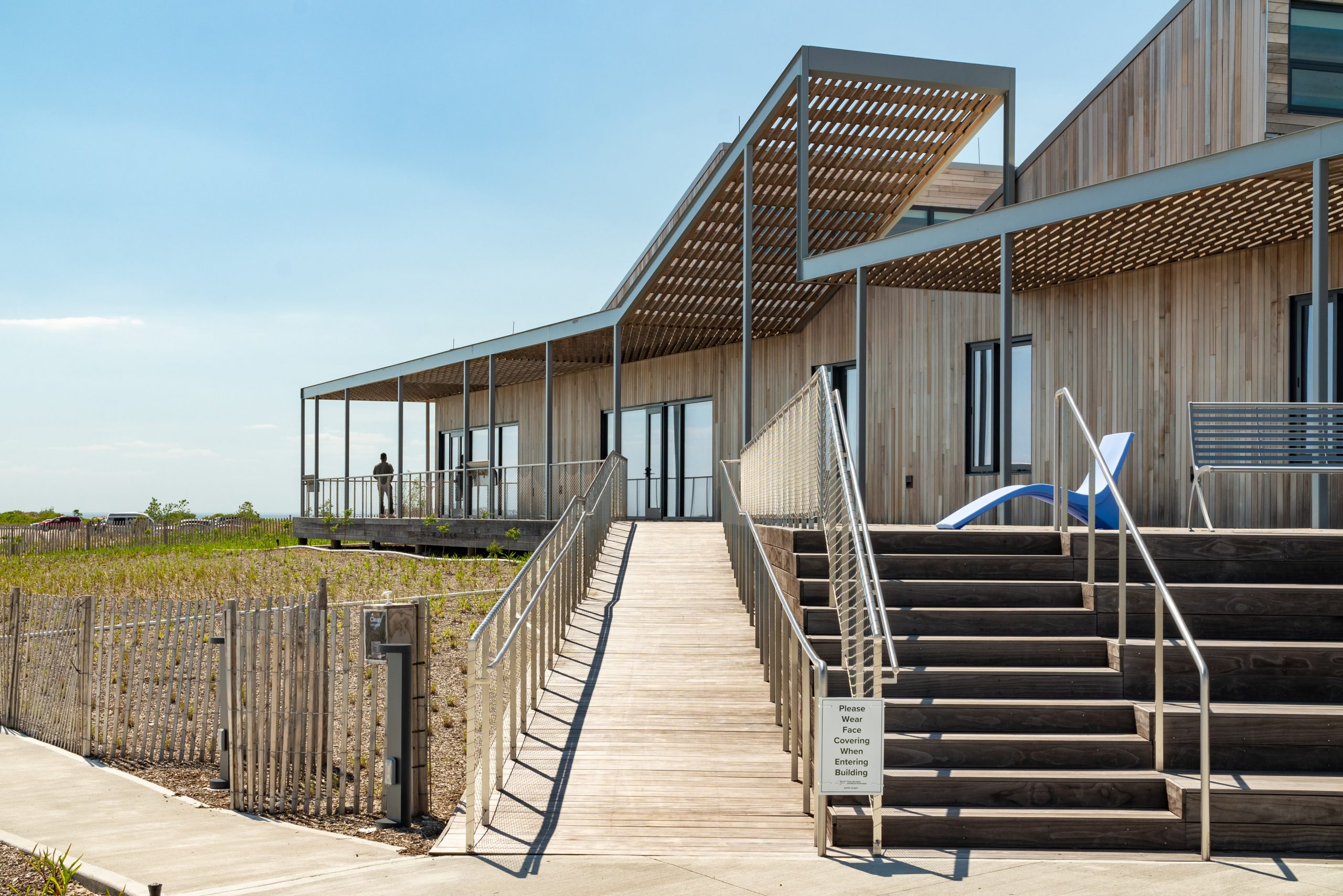 Outside view of the Jones Beach Energy & Nature Center in Wantagh, New York during the day featuring Kebony modified wood clear decking