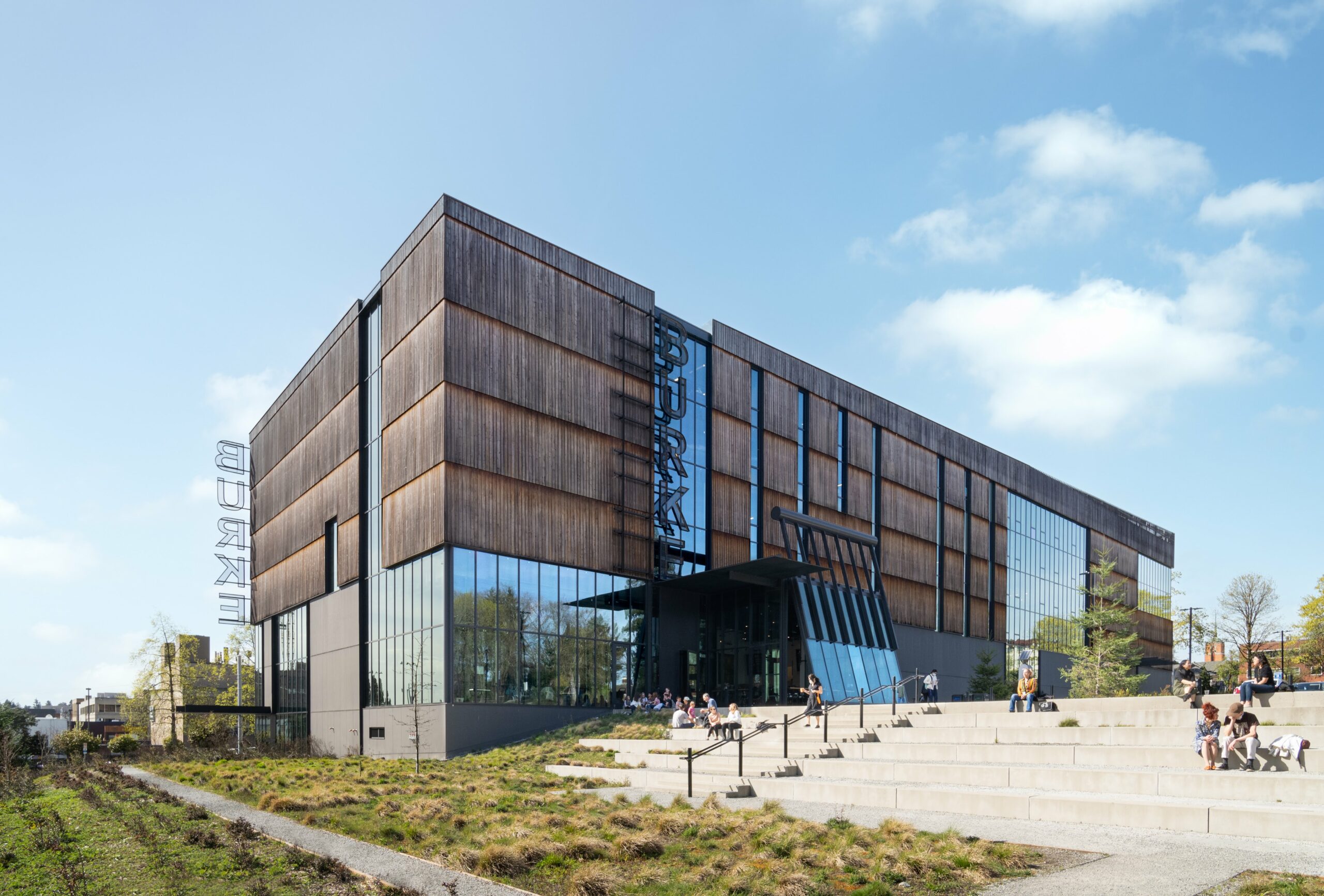 Exterior three-quarter view of the burke natural history museum during the day featuring kebony modified wood click in cladding